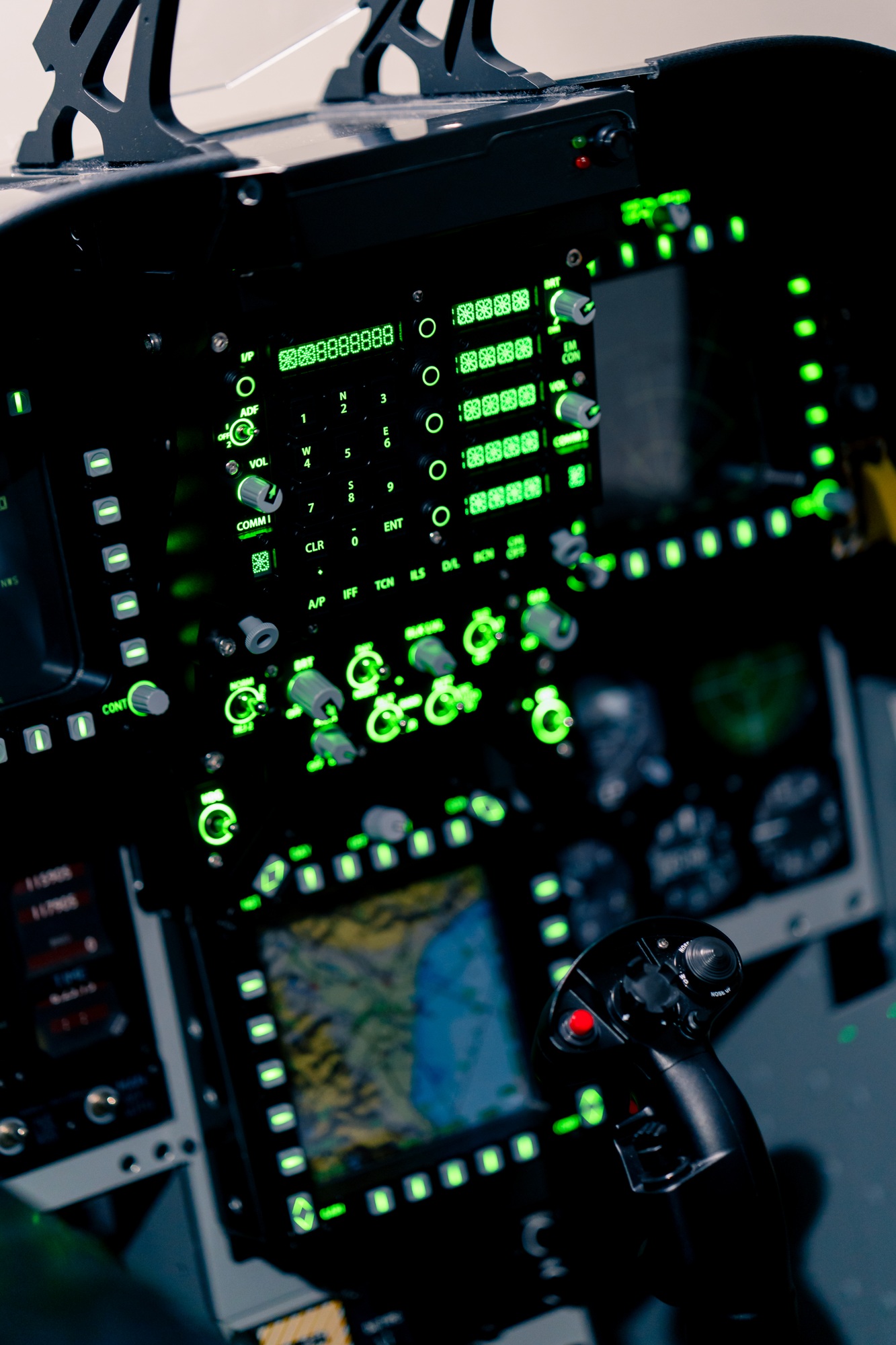 close-up of the cockpit of plane with many buttons on the control panel of airplane flight simulator